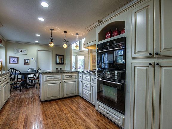 Gourmet Kitchen includes a built in microwave, stunning granite counters and . . .
