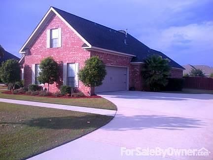 Driveway View : Carriage Door on Garage