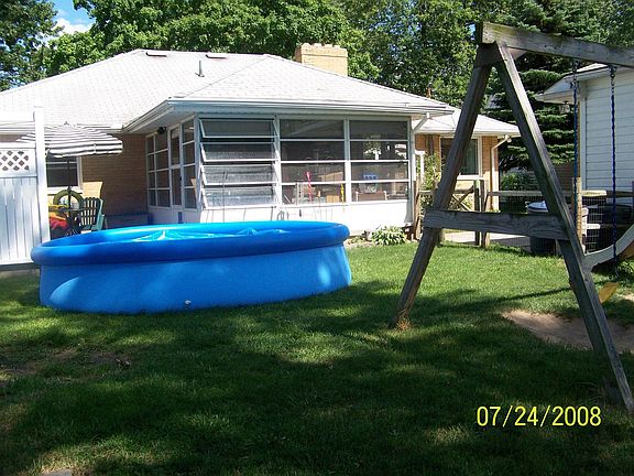 Back yard with deck and screened porch
