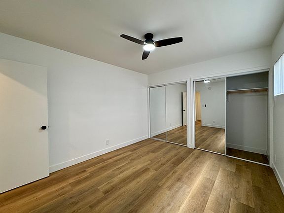 All photos are actual photographs of a comparable unit with a similar floor plan and finish style, shown for reference only.