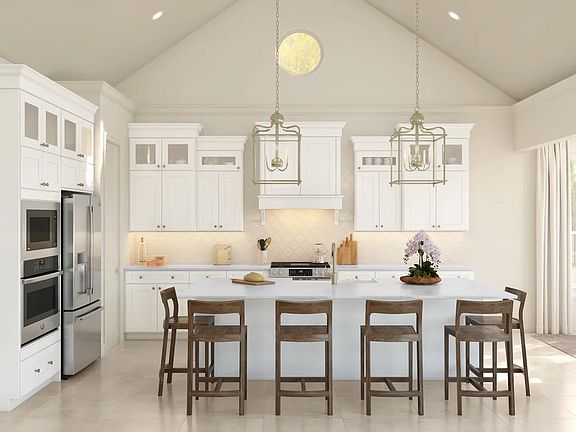 Kitchen with glass upper cabinets and sloped ceiling