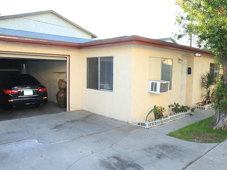Front of house showing the garage.
