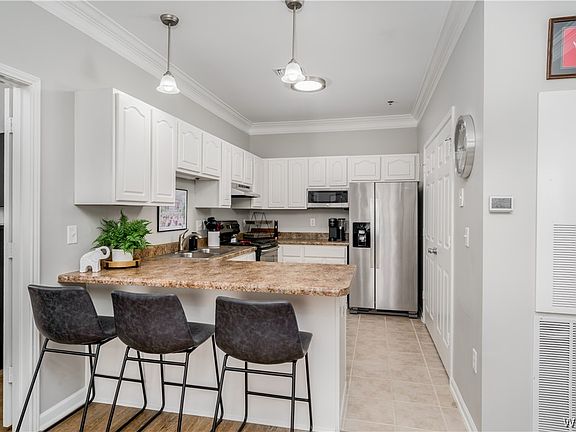 4th image of 303 Helen Keller Blvd APT A203