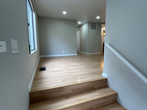 Stairs leading up to the living room