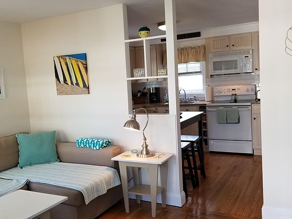 Living room looking into kitchen