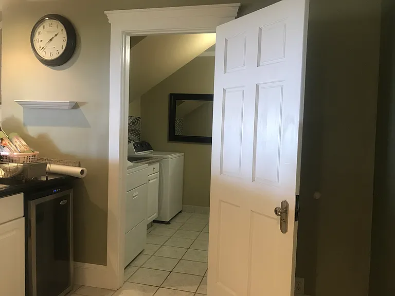 ENTRANCE FROM BEHIND BAR (WITH COOKTOP, DOUBLE STAINLESS STEEL SINK, CABINETS & DRAWERS WITH BEVERAGE COOLER