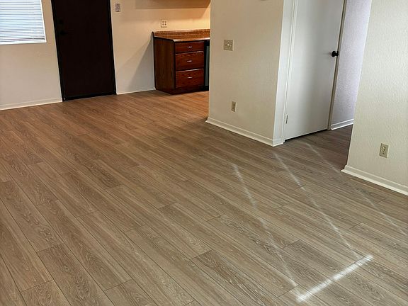 Living room leading to kitchen