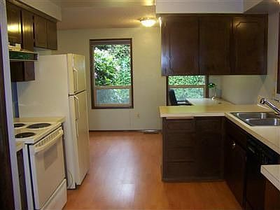 Kitchen with Cherry laminate floors