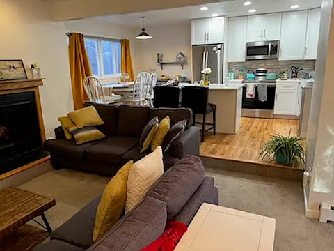 middle floor view of kitchen and dining room from the living room