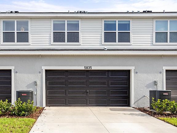 An attached 2-car garage is located on the rear of the home.