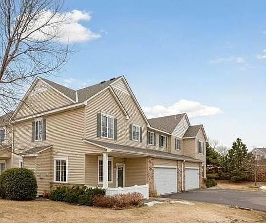 End unit with private patio.