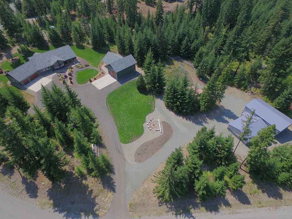 Home w 2 shops on 3 ac.