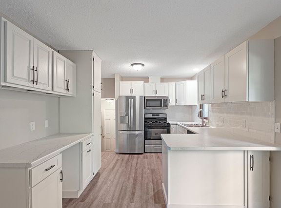 5th image of 5827 Winnetka Ave N #1