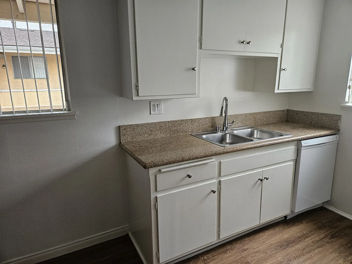 kitchen on left - 1520 Purdue Ave #9