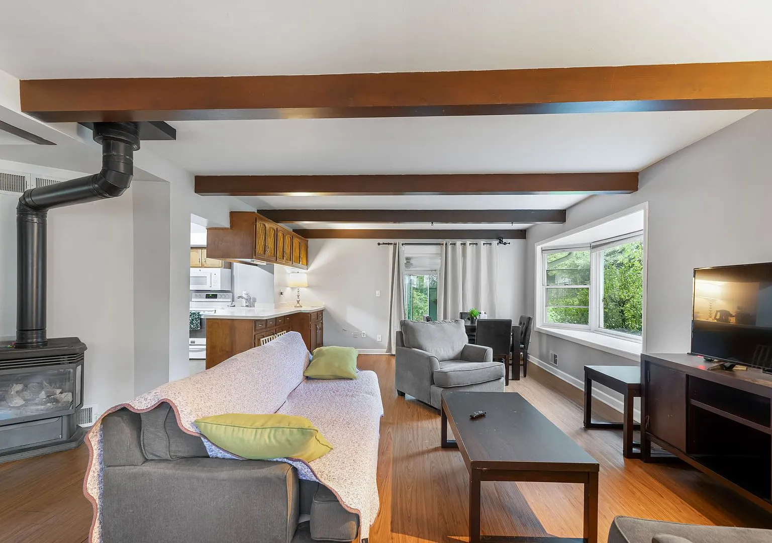 Home-Like Living with Sunroom, Attached Garage & In-Unit Laundry — Photo 1