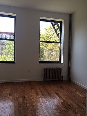 5th image of 70 E 3rd St APT 12