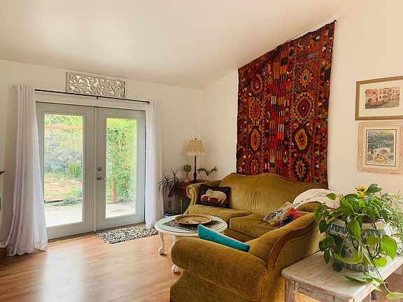 living area with french doors to back yard