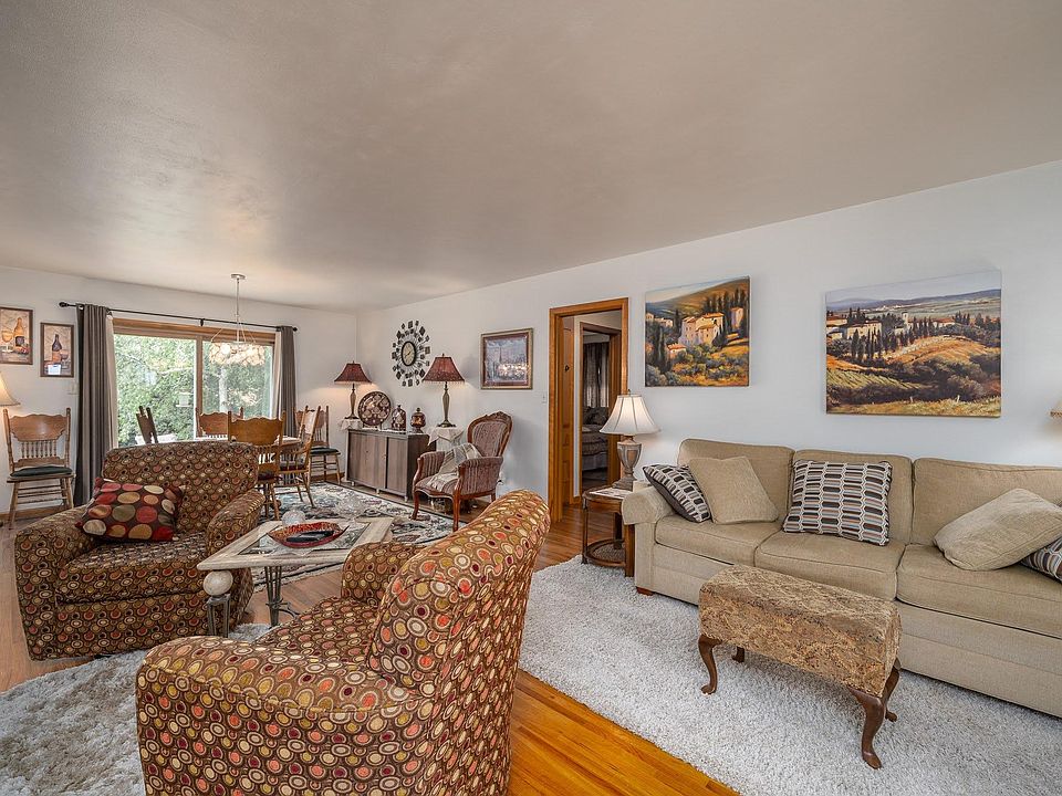 Main living area flows into dining area and kitchen.