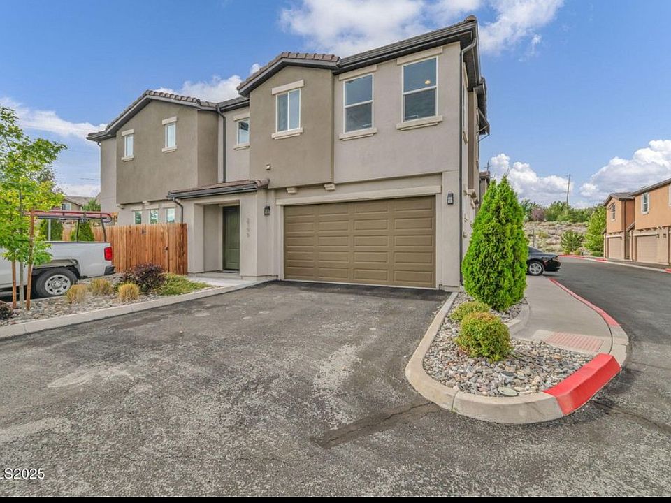 External view with 2-car garage.