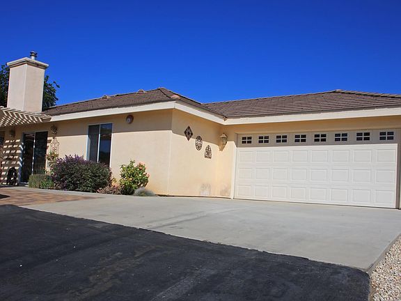 The private driveway leads to the two car garage.