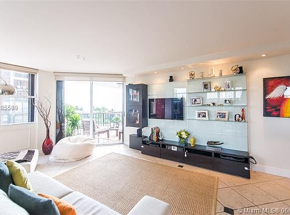 Light filled condo on Brickell with partial bay views, open living spaces & a large covered balcony.