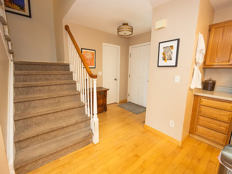 front entryway, stairs, kitchen