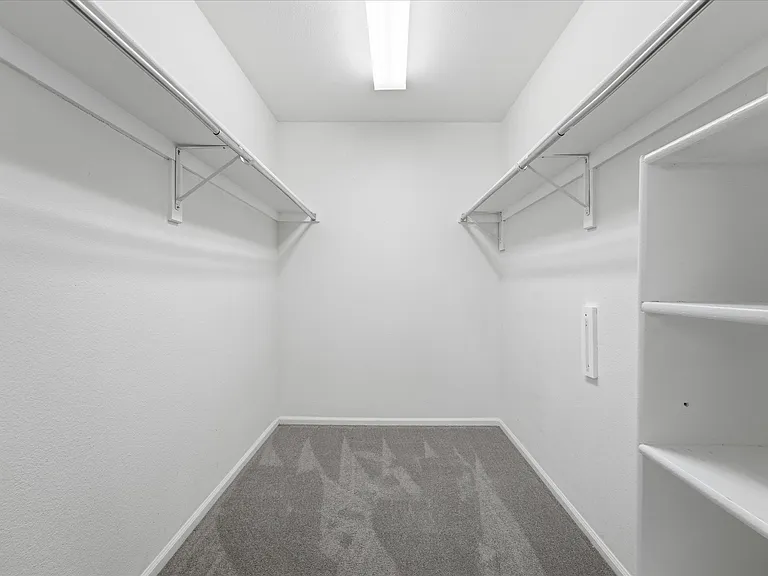 Primary Bedroom offers a walk-in closet