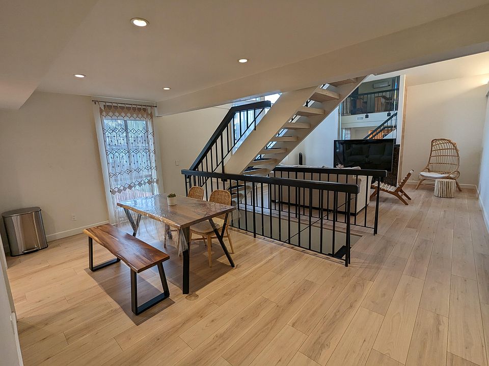 Spacious living room and dining room. New hardwood floor throughout.