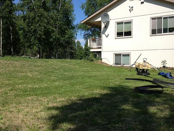 View of the house back lawn