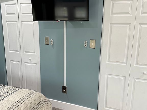 2 extra large closets in bedroom #1
Iron and iron board located inside.