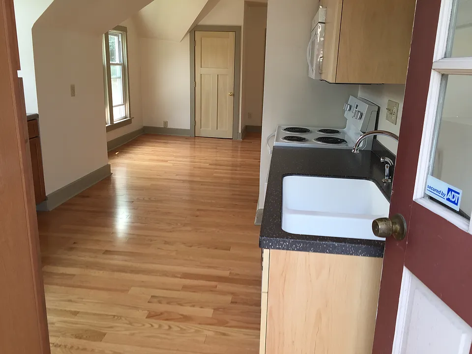 Kitchen looking into living room