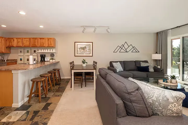 Living Room and Dining Area-seats 8 with four at the bar and four at the table.