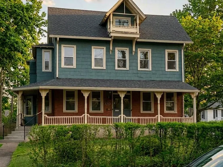 Front view of the home (4 apartments total). Porch has been redone since this photo.