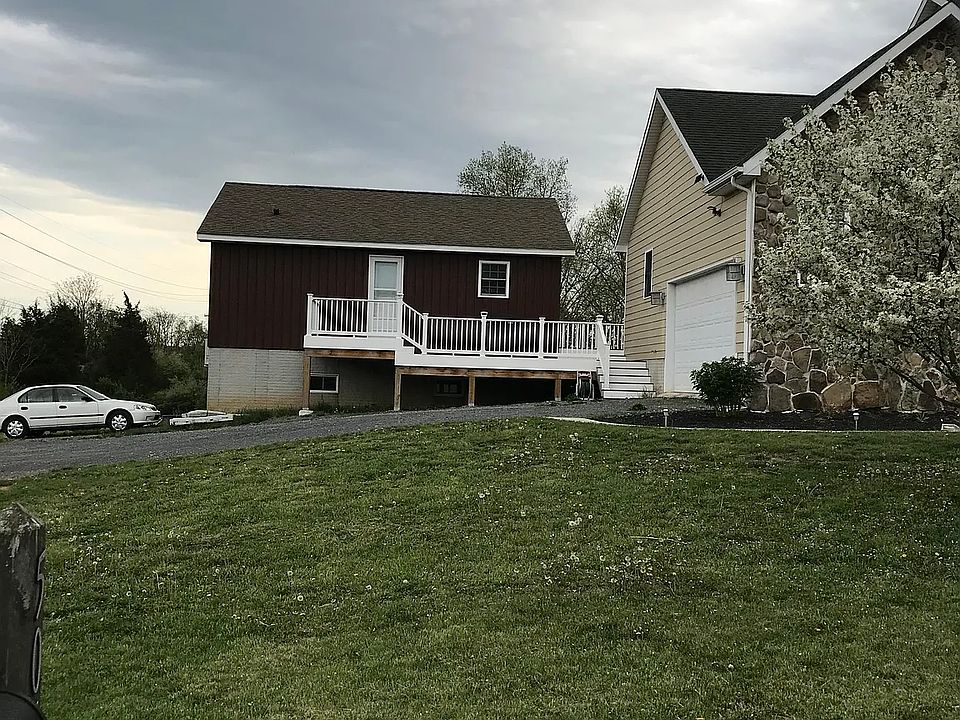 Exterior view looking south from Anderson Rd. (shared mailbox).
Quiet, rural setting at end of Anderson road. Secondary entrance/exit on east wall of the apartment. Deer often present in yard in the early mornings and evenings.
