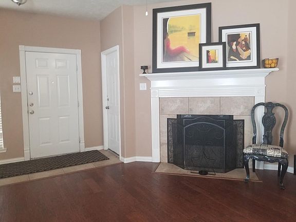 Cozy fireplace with black protective screen