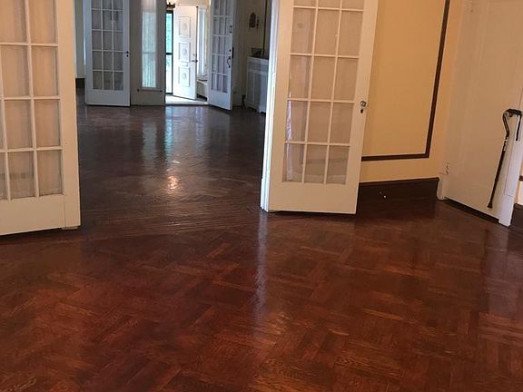 Another Angle of Front Entrance View of Livingroom & Dining Room