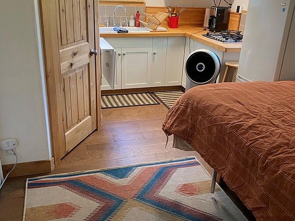 New wood flooring throughout unit