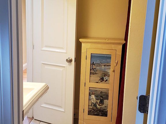 Entrance by front door to bathroom