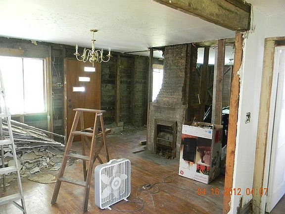 House gutted n old fireplace
