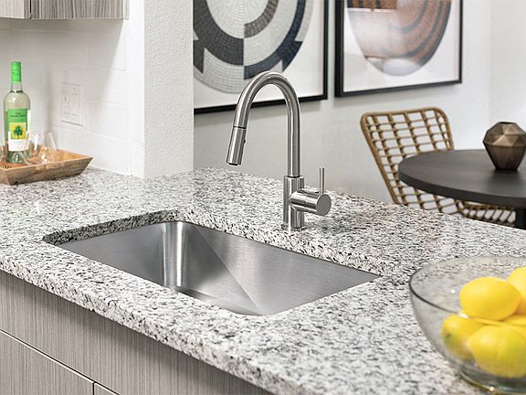 Granite countertops in newly upgraded kitchens and bathrooms
