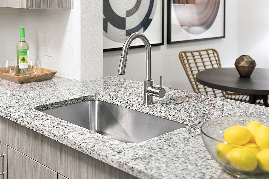 Granite countertops in newly upgraded kitchens and bathrooms