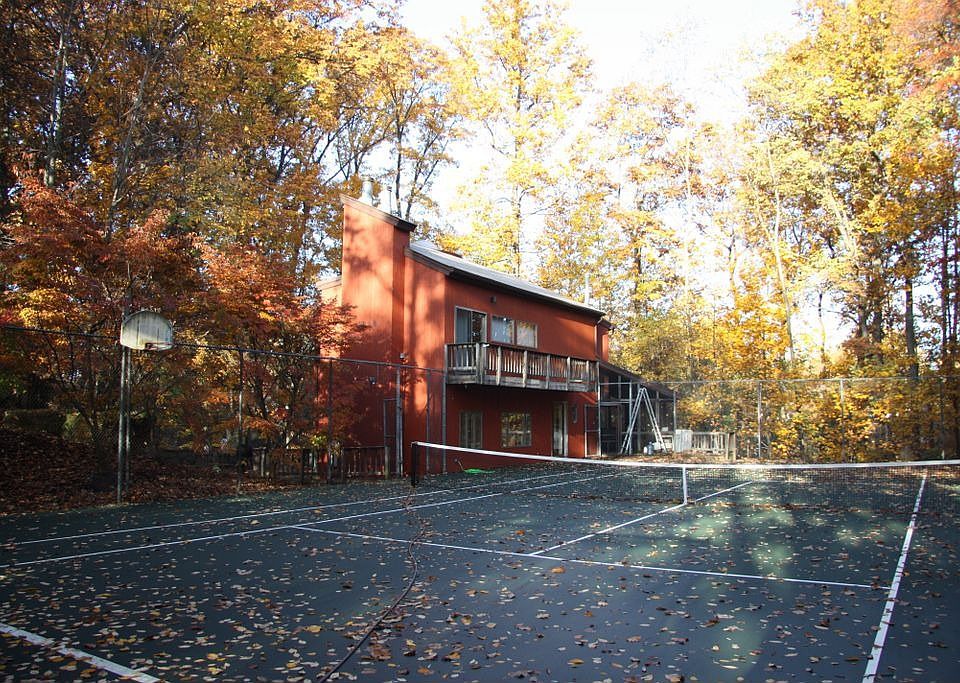 Front of house as viewed across the tennius court