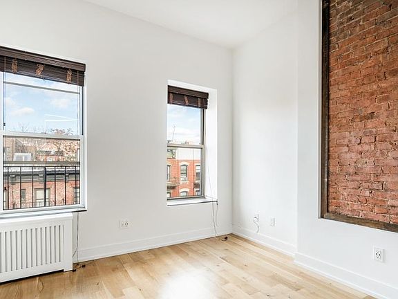 2nd image of 66 E 7th St APT 8