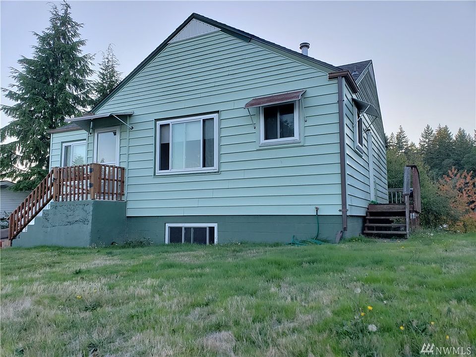 Not only is it cute, it's surprisingly large with a whole livable downstairs and a detached garage!