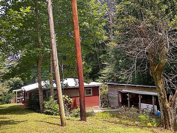 The house and shop, carport