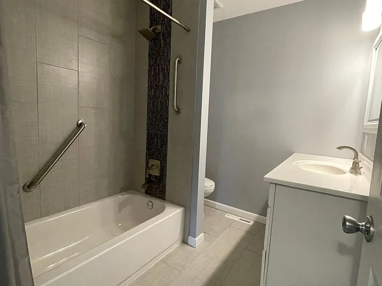 Upstairs full bathroom is newly remodeled.
