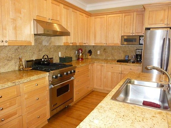 Viking range and hood, Bosch dishwasher, full open glide drawers, ample counter space.