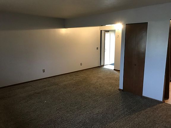View of living rom / dining room and coat closet
