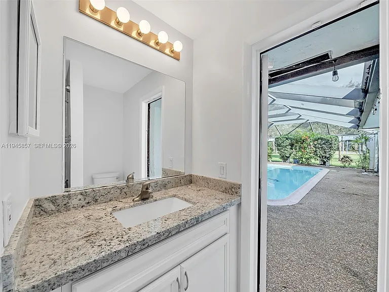 10251 NW 39th Ct — Photo 42