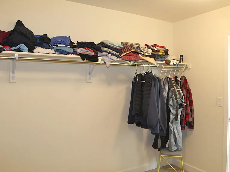 Primary walk in closet is 9'4" by 10'4"